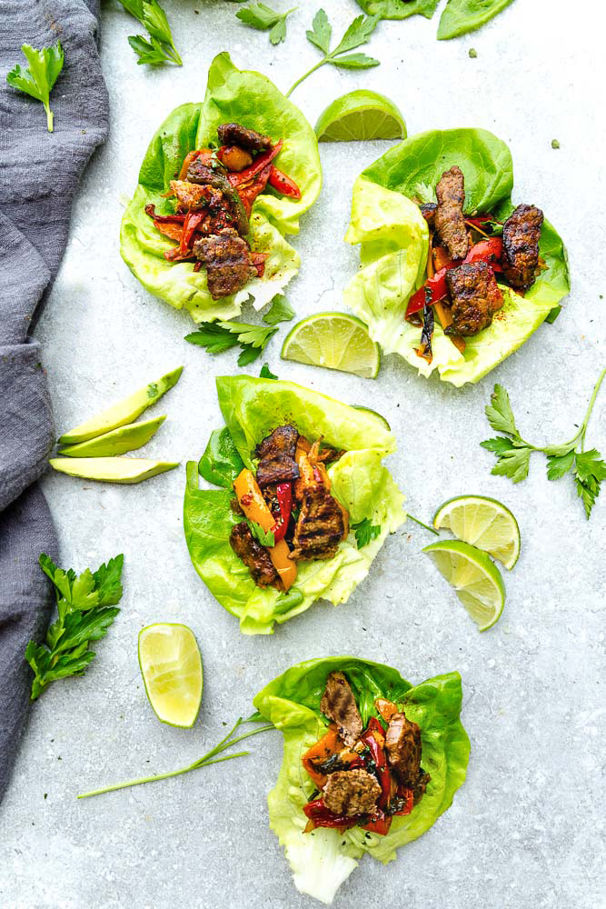 Stake Fajita Lettuce Wraps – fresh, flavorful and a healthier way to enjoy tacos or fajias! Less than 30 minutes to make with a homemade seasoning and perfect for lunch or a lightened up dinner for busy weeknights! They are also gluten free, low carb, Keto and Paleo friendly, whole 30 compliant and a healthy meal for your own Cinco de Mayo or Mexican fiesta