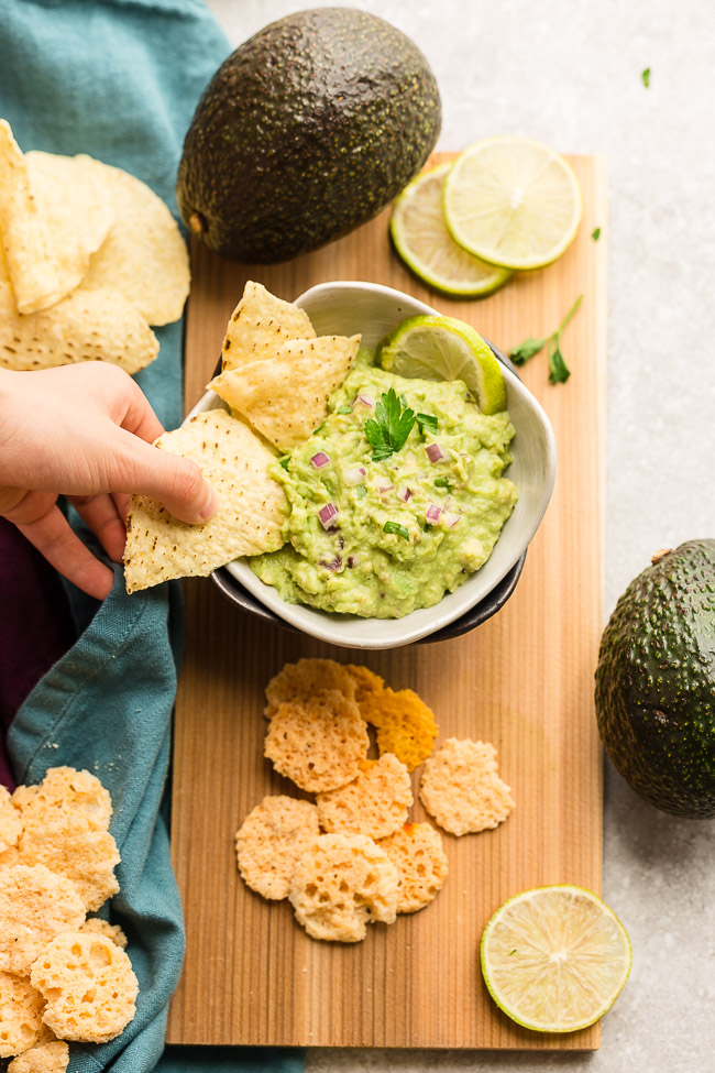 Low Carb Guacamole - this homemade recipe is the perfect party dip and keto, paleo and Whole 30 snack. Pairs perfect with fajitas, salads or by the spoonful.