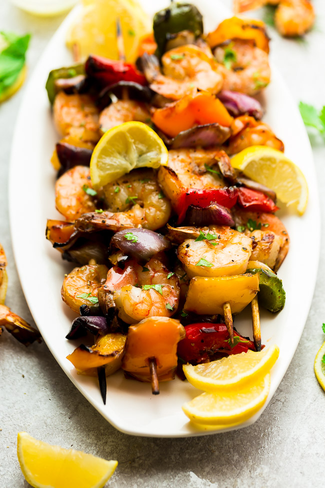 Grilled Lemon Shrimp Skewers with Vegetables coated with a buttery garlic lemon sauce. Low carb, keto and perfect for patio season.