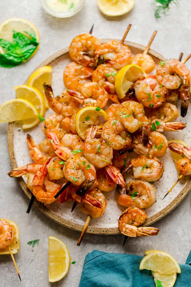 Low Carb Shrimp Kebabs with Lemon Butter Sauce - easy grilled shrimp skewers seasoned with a fresh and flavorful lemon butter sauce. Perfect keto-friendly appetizers for summer parties or serve with your favorite side for lunches and dinners. 