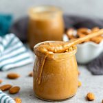 How to make Homemade Almond Butter – Learn how easy it is to make healthy and delicious homemade almond butter using your food processor or high speed Vitamix blender. It comes together quickly and makes a delicious snack alternative to peanut butter.